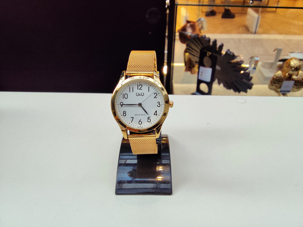 Reloj dorado Q&Q